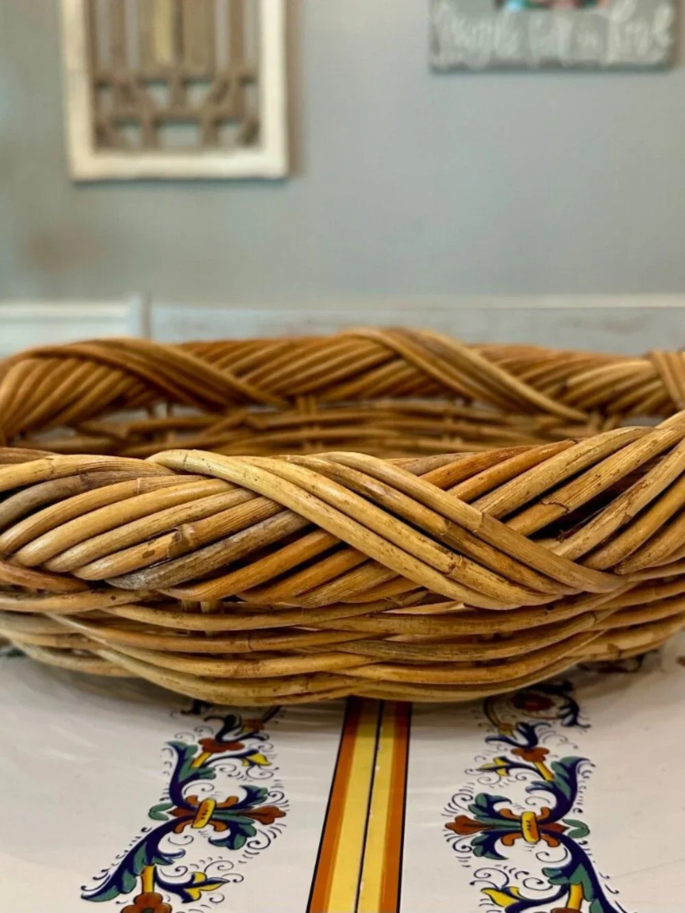 vintage round, hand-woven rattan or wicker basket